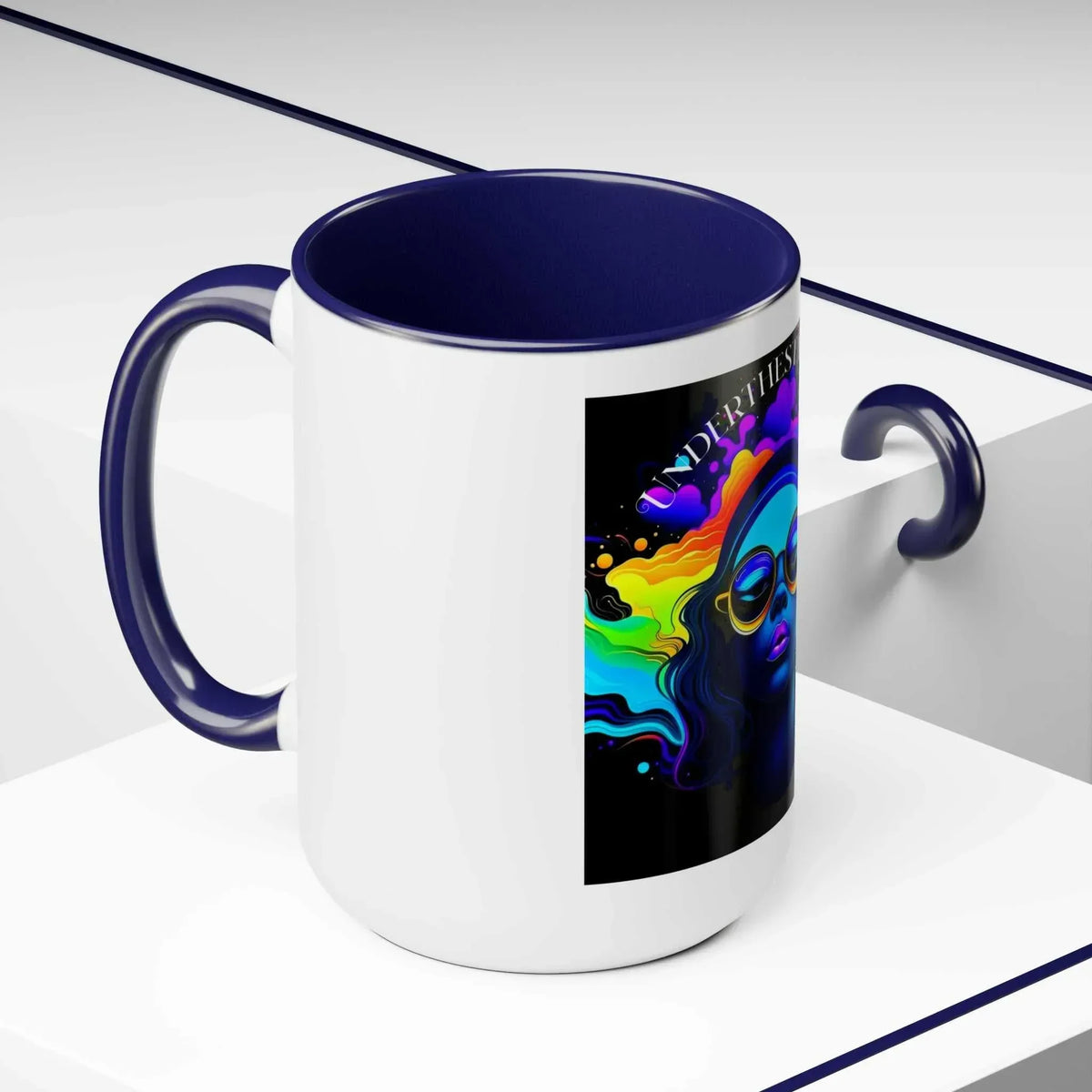 White ceramic mug with navy handle, featuring a colorful psychedelic woman illustration.