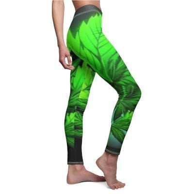 Green herbal leaf print leggings, side view on model, bold nature-inspired activewear