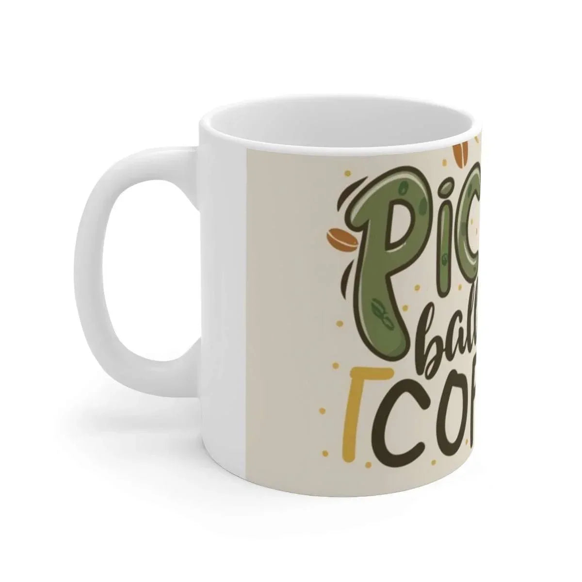 White ceramic mug with playful pickleball coffee text and green, brown, and yellow accents