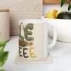 Ceramic pickleball coffee mug on kitchen counter with bold sporty text design